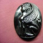 Griffin. Onyx. size 4 x 3cm
Cameo. Relief is carved on a black colore
stone. Differens between polished and mat
surface of relief used.