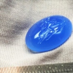 Handcarved intaglio,antique gems replica,
mythology image-Cupid on a Dolphin.
blue agate, size 15 * 20mm