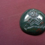 Amulet. Bloodstone. size 2.3 x 2.4cm
A crown and two arms are ingraved in intaglio technic
on a strong polished surface of gem.