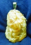 Amber. size h - 8cm  Satir and Nymph
Cameo. Flowers and flying cupids around
figures are carved on all surface of miniature.