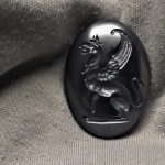 handcarved intaglio,antique gem replica
mythology image- Griffin
hematite stone
size29.5 * 21.5mm